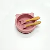 Ciotola in silicone bordeaux a forma di orsetto con cucchiaio e forchetta in legno