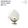 Ornamento con sfera di cristallo: cinque anelli