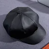 Black eight-pointed cap