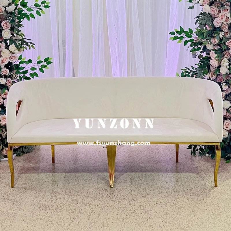 Velvet upholstered bridal couch with gold stainless steel base - side view