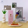 Blue rose with pink box