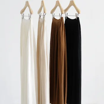 In spring and summer extremely fashionable and high-waisted pleated skirts soft and comfortable and long skirts