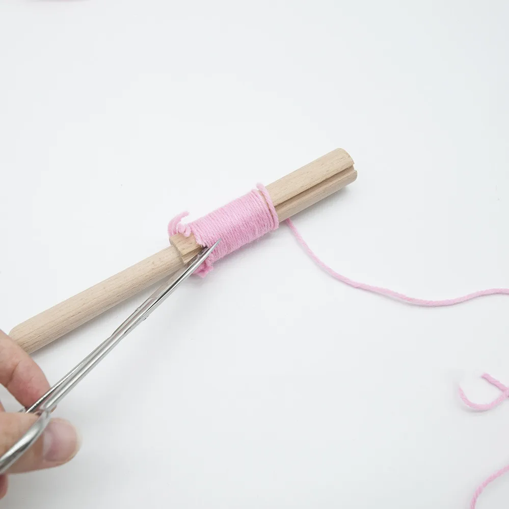 crochet yarn cutter and wooden bent