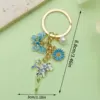 Mariposa azul del Día de la Madre, perla, flor de iris - 99g - er1541