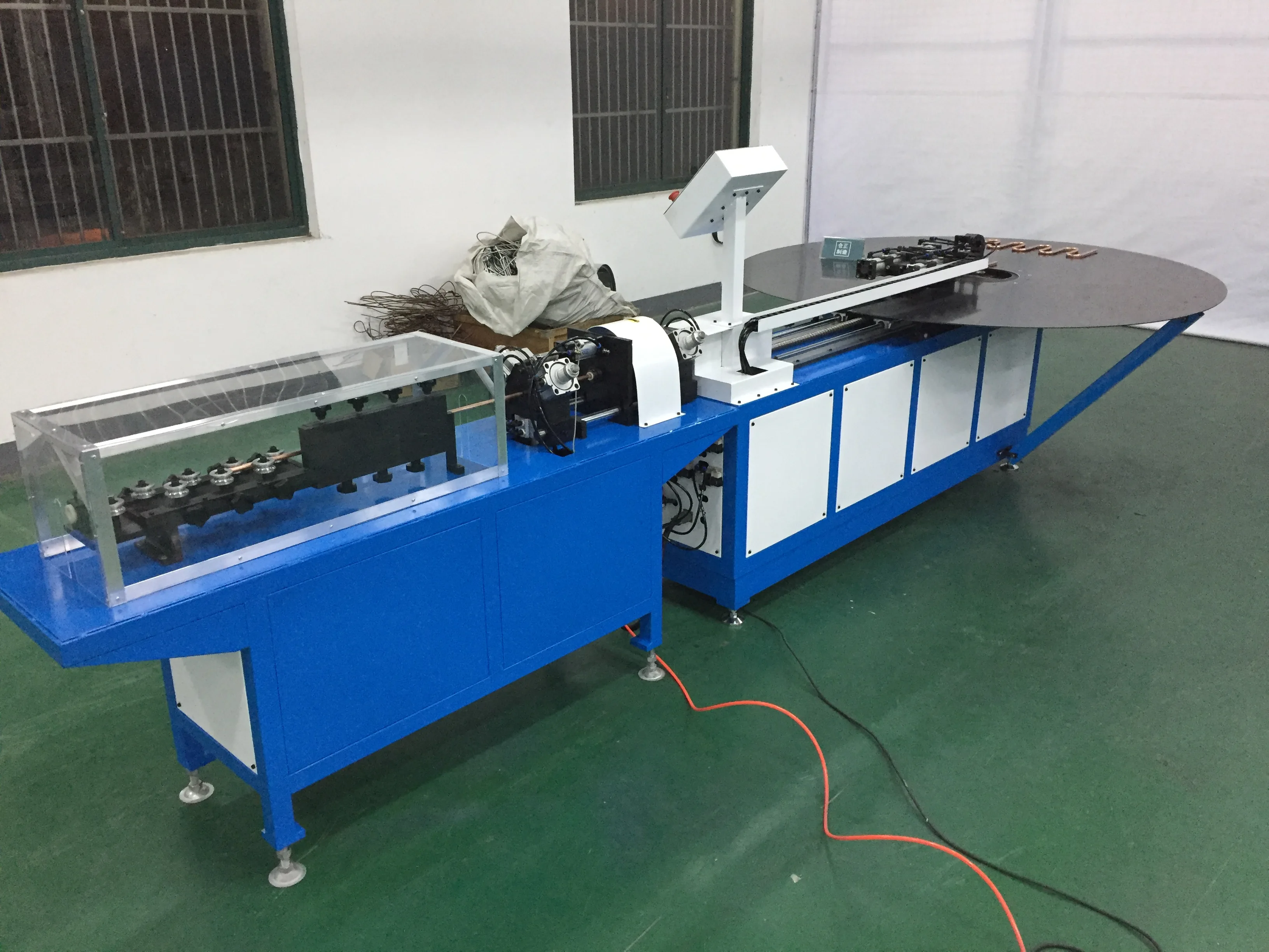 BOBO Machine heat exchanger copper bundy tube straightening cutting and shown in a detail photo for this news article