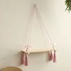 Tavola in legno con fiocco rosa