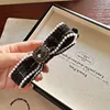 1255 Pinza Banana Negra