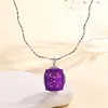 Colgante morado con cadena curva