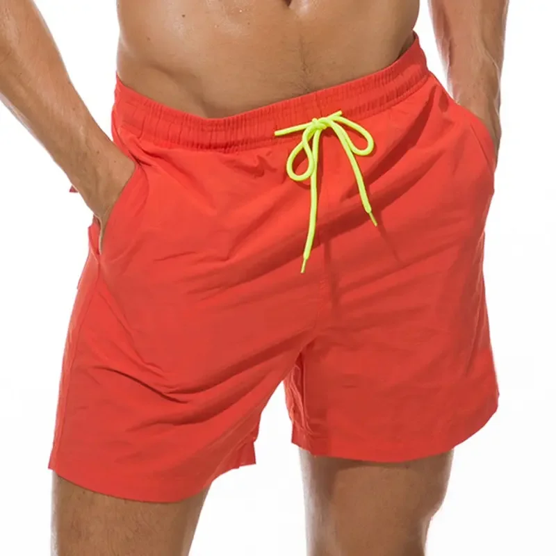 New 2023 apparel stock wholesale Summer Elastic Waist Mens Running 100% Polyester Solid color drawstring Swim Mesh Beach711_voghion.com