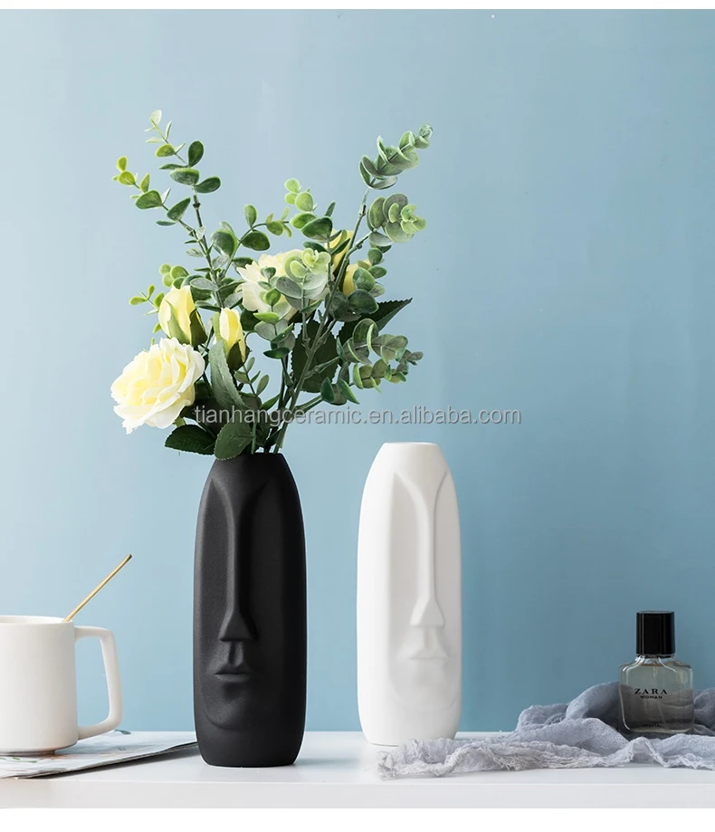 Custom modern nordic style creative gift home decoration accessories human face ceramic vase.jpg
