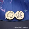 Plaque ronde à suspendre avec le caractère "Fu" en écriture cursive de Mao Zedong.