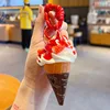 Artificial cone fruit ice cream-strawberry lava filling