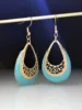 Gold, turquoise orchid