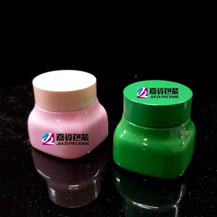 face cream jars with matte pink lids.jpg