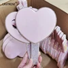 coeur rose avec diamant