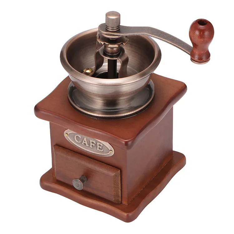 Manual coffee bean grinder. Ground coffee powder with both hands