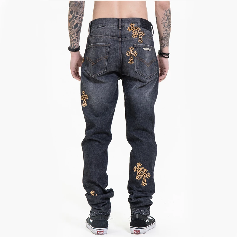 cross patch denim jeans