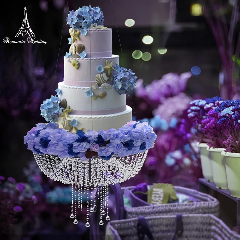 Five-Tier Art Deco Inspired White Wedding Cake With Silver Painted Details  on Hanging, Suspended Cake Stand