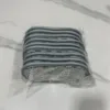 Nueve piezas en gris (bolsa OPP)