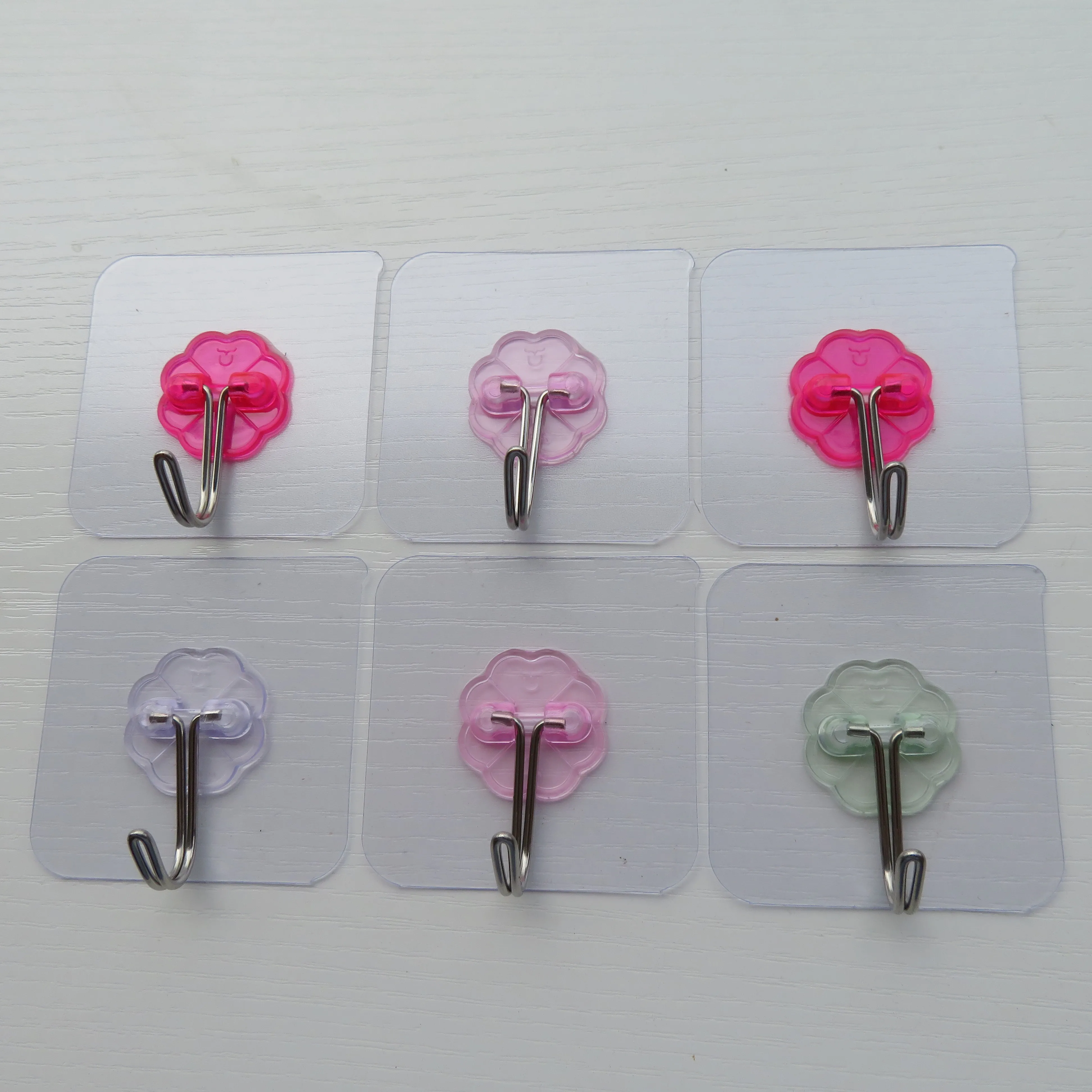 Can process and customize a variety of color plum pieces of metal traceless novelty hooks factory direct sales factory