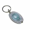 Porte-clés lumineux à LED, coque blanche et lumière blanche.