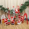 Père Noël à double échelle rouge