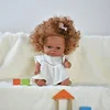 Milk white dress with brown skin and blonde hair