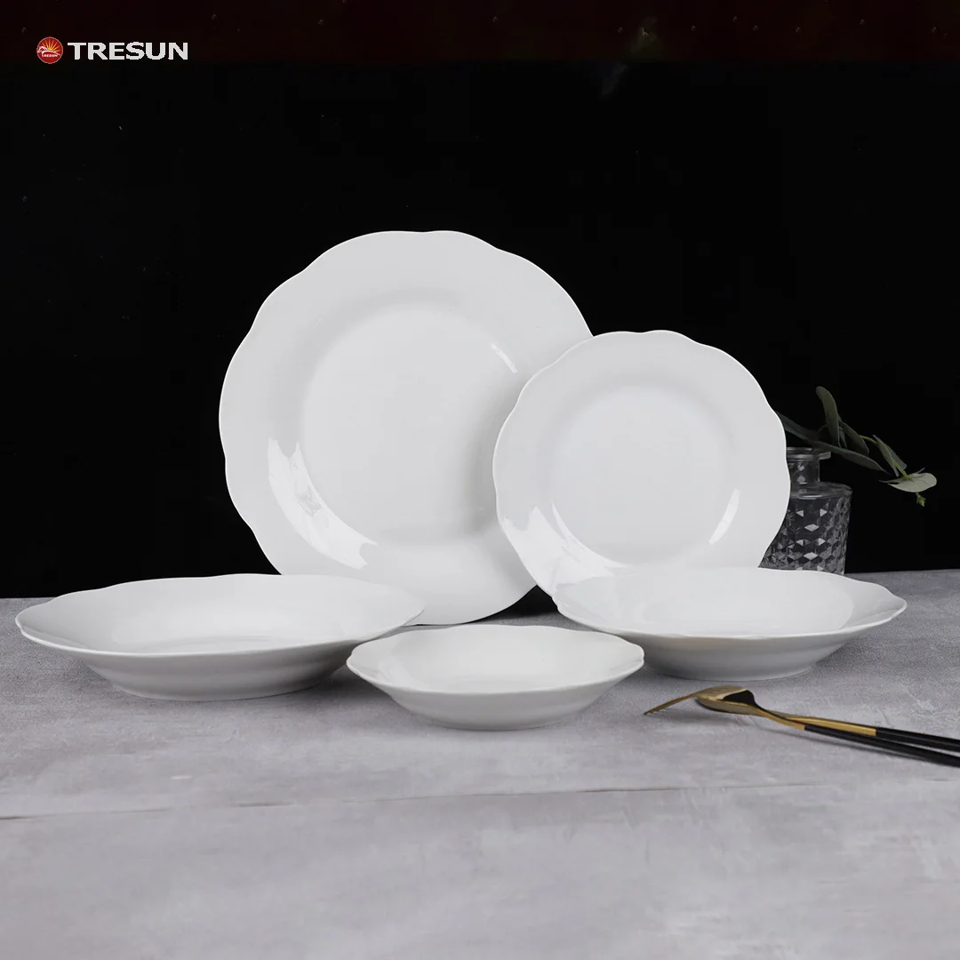 Großhandel Überbackene Kante China Luxus Moderne Restaurant Porzellan Nordischen Weißen Teller Set Keramik Platten Für Die Hochzeit