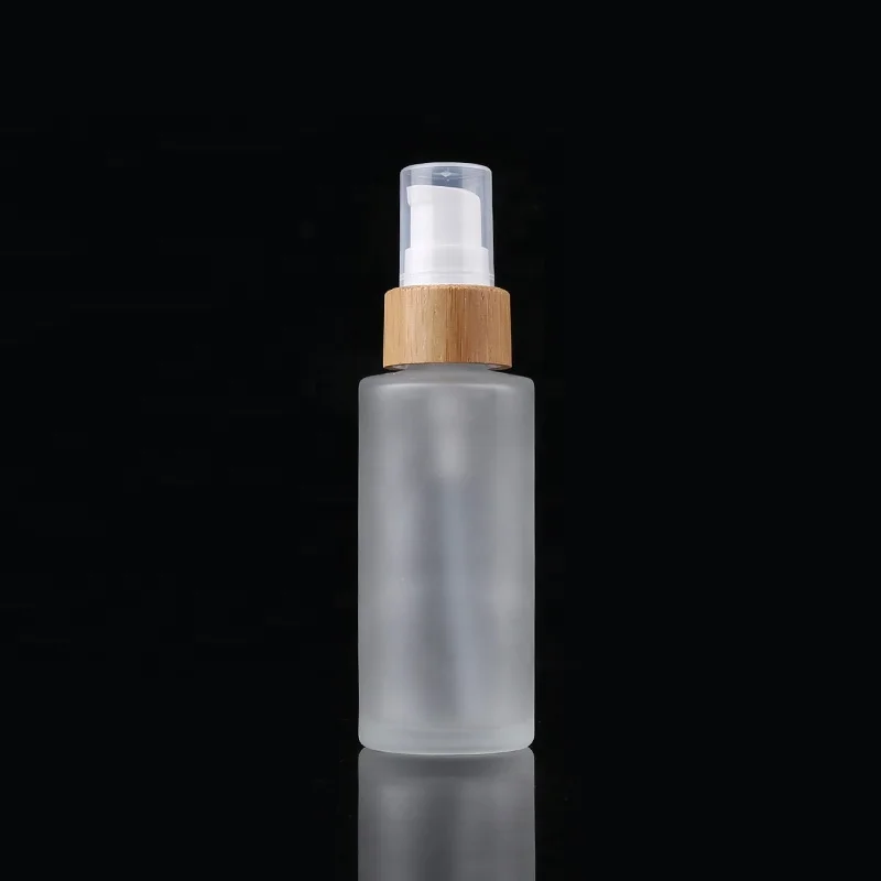 Eco Friendly 20ml Empty Round Liquid Packaging Container Frosted Glass Packaging Spray Bottle With Bamboo Pump Sprayer