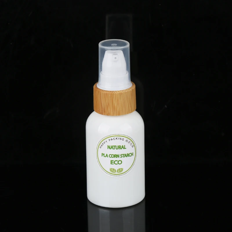 Natural 50ml 100ml PLA Material Polylactic Acid Biodegradable Lotion Bottle with Bamboo Cover for Shampoo