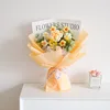 Borsa regalo con bouquet di rose gialle sfumate