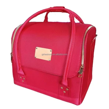 Red nylon portable travel makeup bag nails polish bag with trays customize metal badge logo