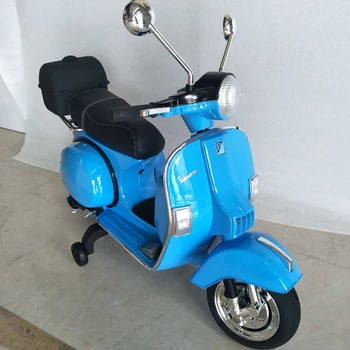 Vespa vert d'eau PX150. scooter électrique pour enfants 12V 4.5Ah. 1 Vespa vert d'eau PX150. scooter électrique pour enfants 12V 4.5Ah. 1