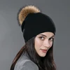Black with brown pom