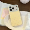Giallo mango, sale marino, pois blu.