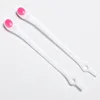 12 white pink buttons