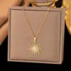 Diamond star and sun pendant on stainless steel necklace