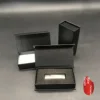 Small black book-shaped box (empty box)