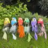 Uccelli di peluche in colori misti: 12 per confezione