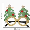 Árbol de Navidad verde, gafas amarillas.
