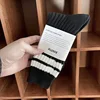 Black with white stripe