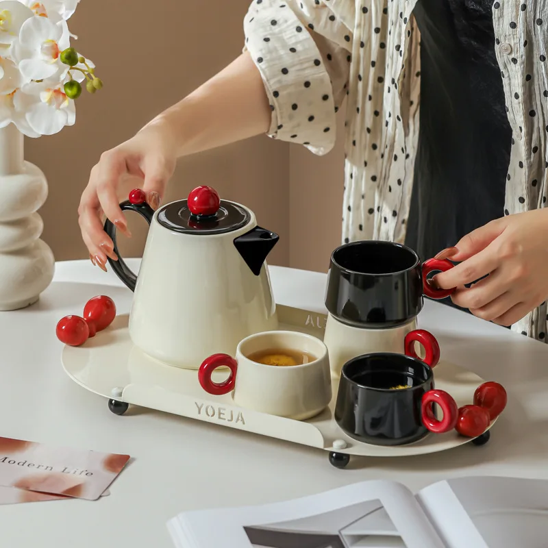 Hot sale of red modern ceramic tea set home gifts must be set of 4 tea set