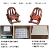 Two rocking chairs in a box