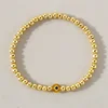 Golden beaded Yellow Devils Eye (No card)
