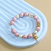 Pulsera de rueda de oración con mantra de seis sílabas - rosa malva