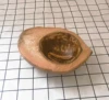 Boat-shaped coconut shell candle wax-free