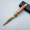 Orange Handle and golden blade
