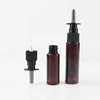 amber body with black nasal sprayer