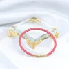 Chiusura oro + pelle di pecora genuina rosa