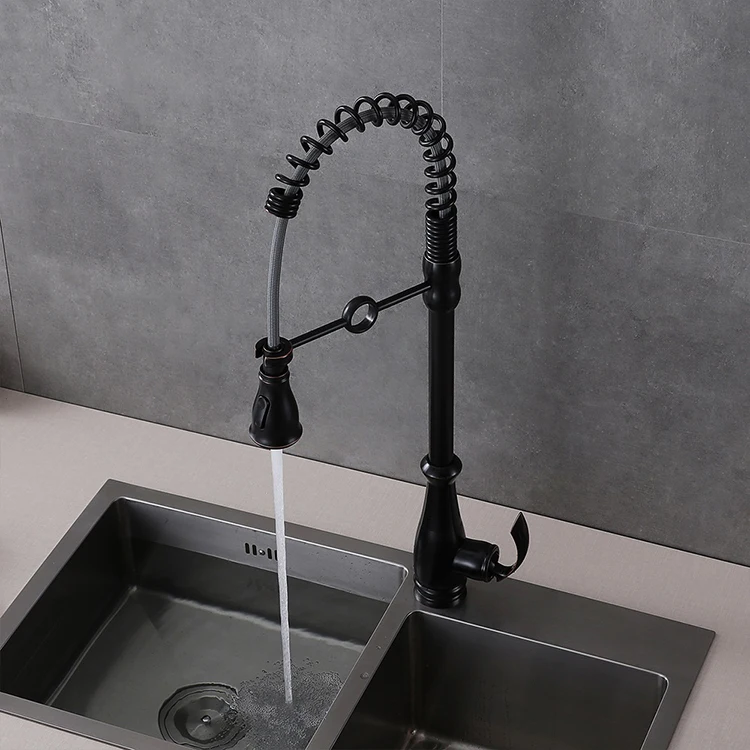 Grifo monomando para fregadero de cocina con resorte extraíble montado en cubierta dorada